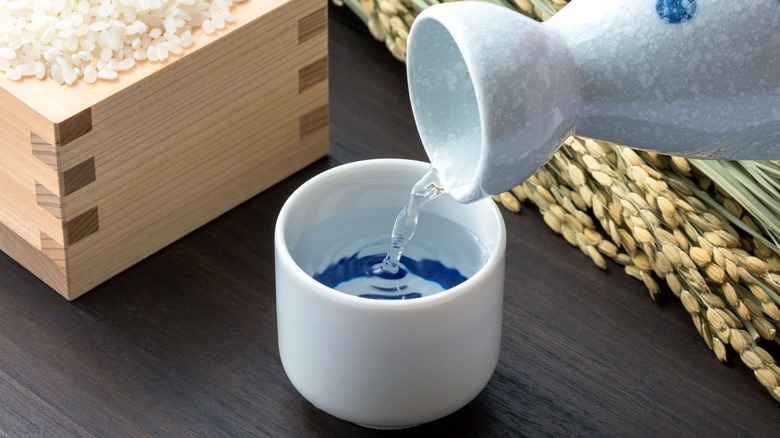 Pouring sake into cup