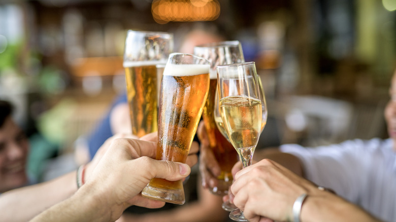 friends toasting with glasses