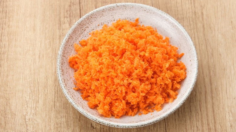 carrot pulp in white bowl