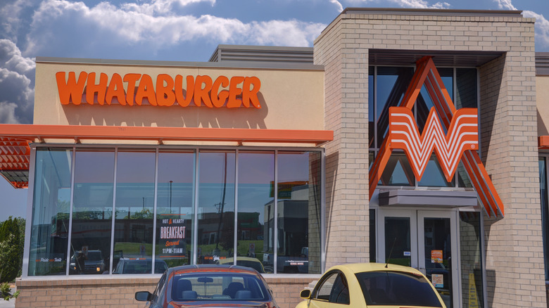 The exterior of a Whataburger location in San Antonio, Texas, during the day.