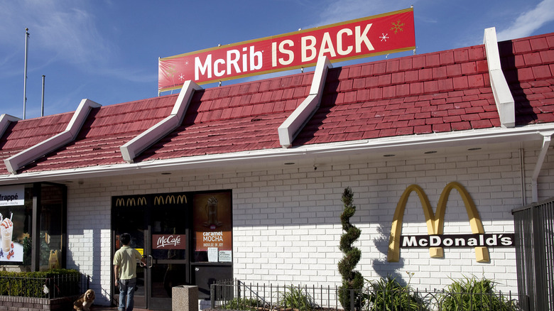 Close up of a McDonald's location with a McRib sign on top of the building