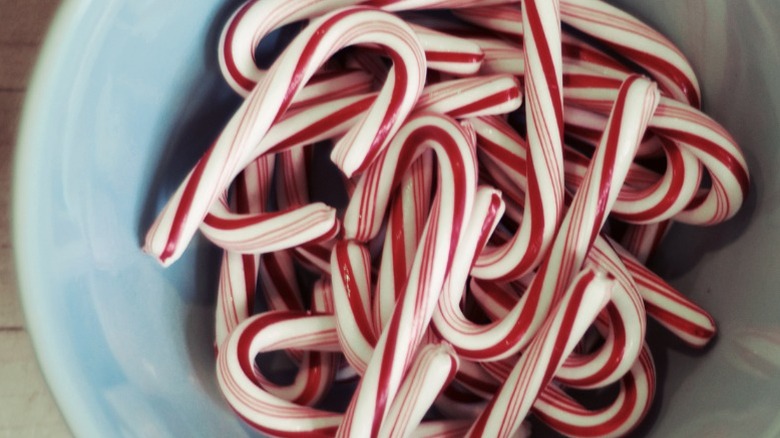 A bowl of peppermint candy canes.