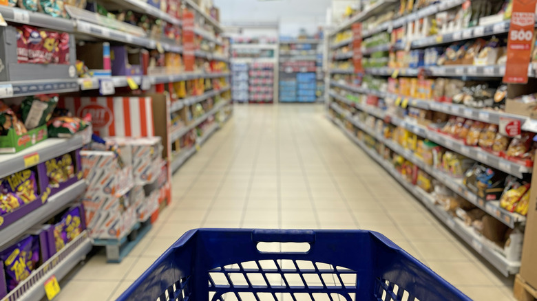 A shopper's perspective of a grocery store aisle