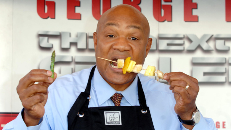 George Foreman enjoys some veggies cooked from his grills