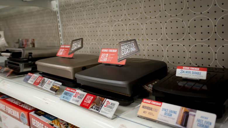 A shelf of George Foreman Grills