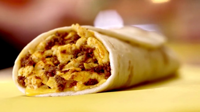 A Whataburger breakfast taquito on a table