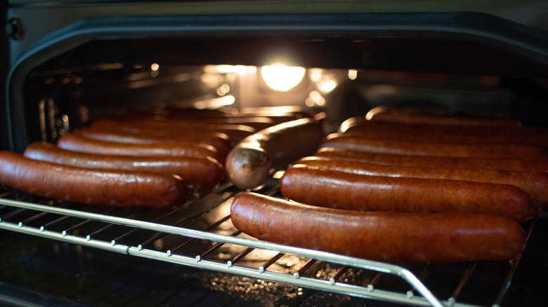 sausages cooking in oven