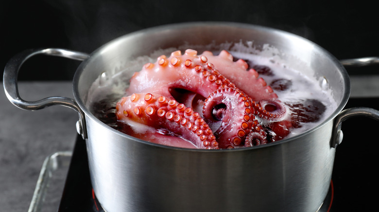 An octopus in a boiling pot of water.