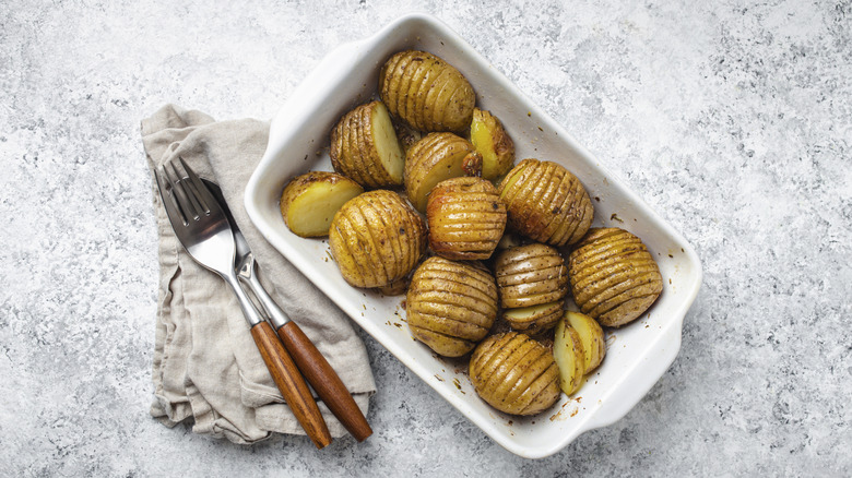 Hasselback potatoes in a casserole dish