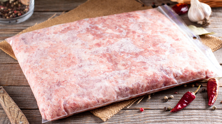 Frozen ground beef in plastic bag