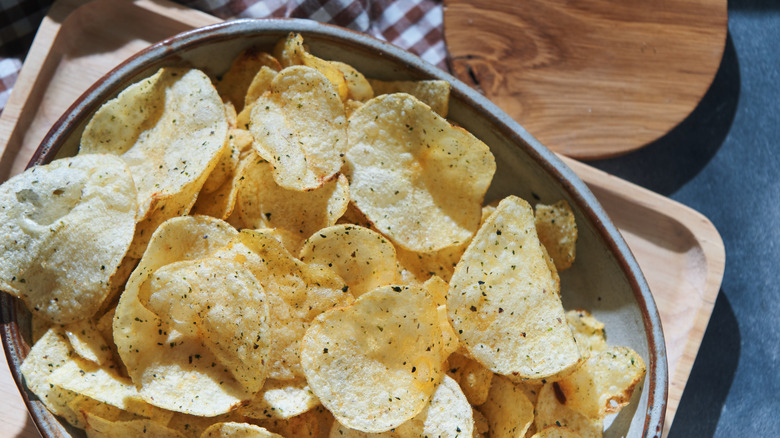 A bowl of seasoned potato chips