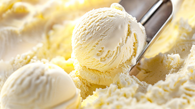 Plain vanilla ice cream being scooped