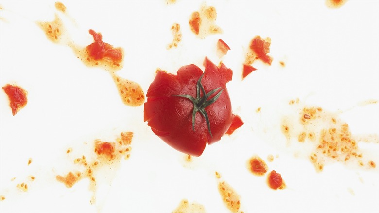 Splattered tomato with its juices