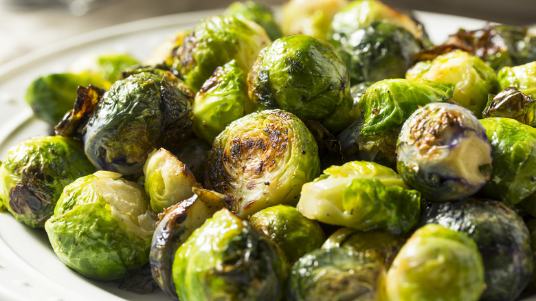 Crispy and charred Brussels sprouts on a plate