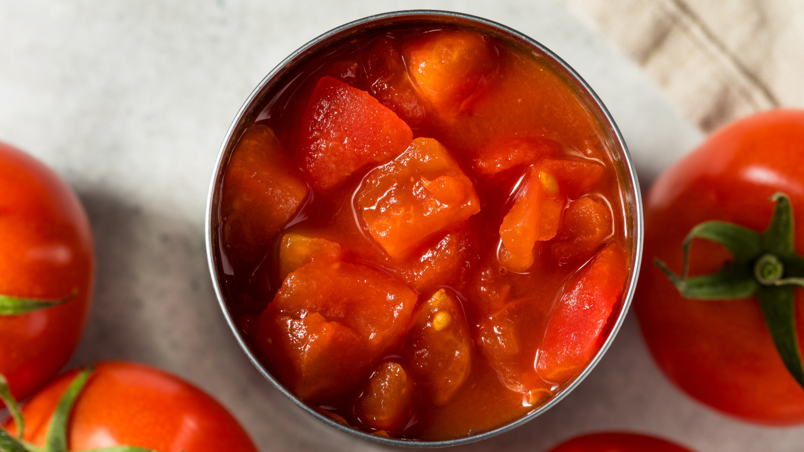 The Fix For Acidic Canned Tomatoes Is Already In Your Pantry