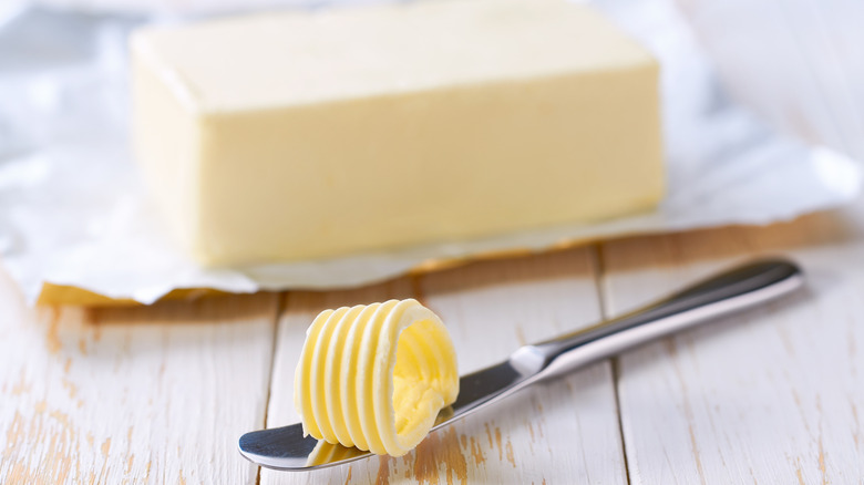 Frozen butter on a knife