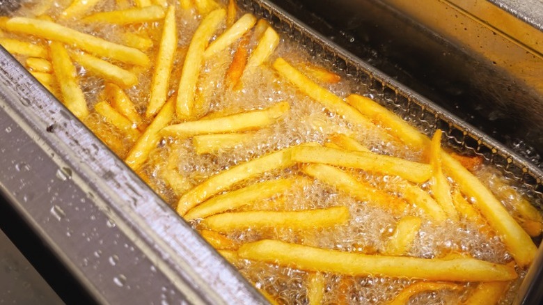 French fries in the fryer.