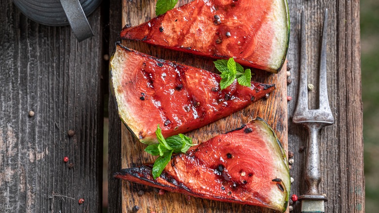 grilled watermelon on table