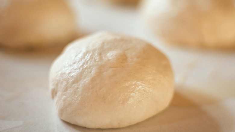 Close up of a pizza dough ball.