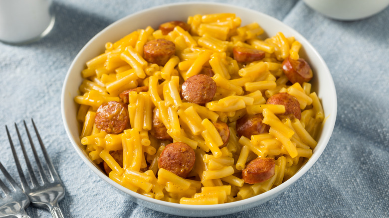 Bowl of boxed mac and cheese with hot dogs