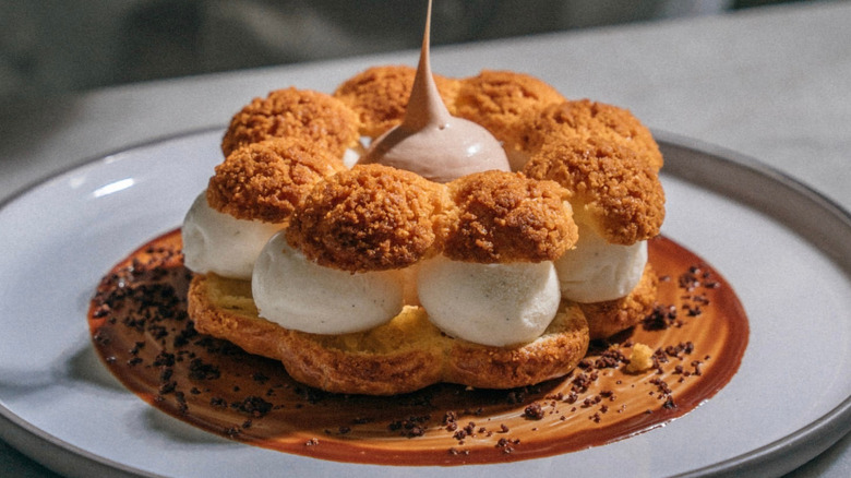 A marshmallow creme cake rests on plate