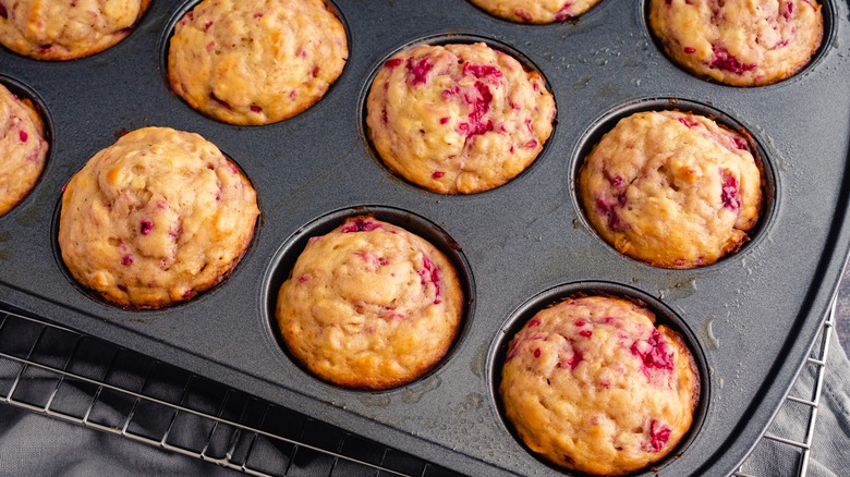 Raspberry muffins in greased muffin tin