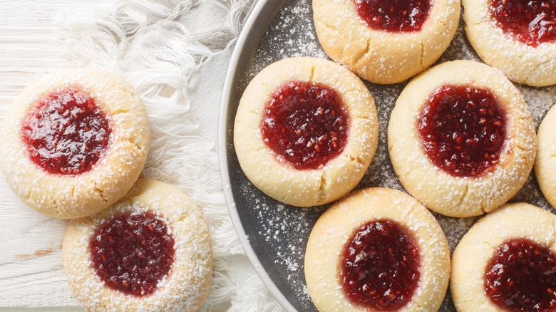 A plate of raspberry thumbprint cookies