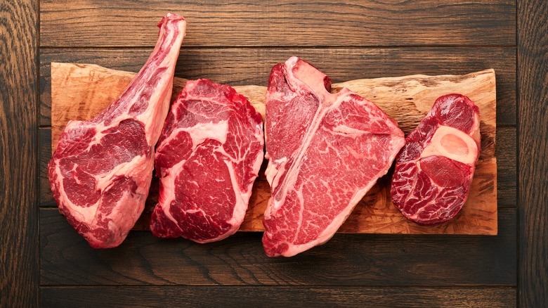 cuts of steak with marbling