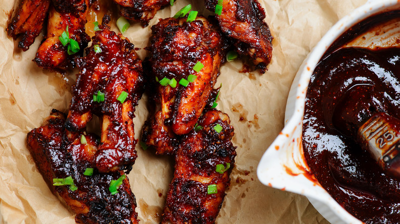 Chicken wings coated with BBQ sauce