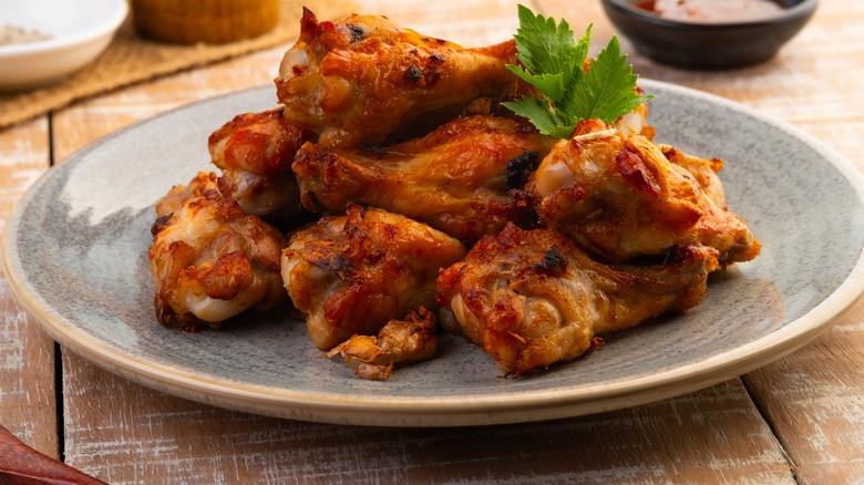 Plate of chicken wings cooked in an air fryer