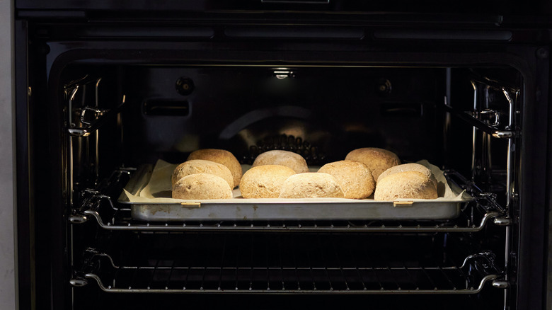 Dinner rolls in a black oven