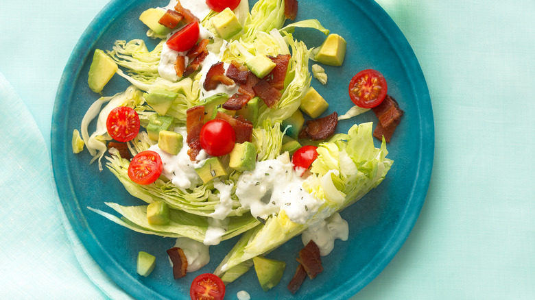 BLT salad on blue plate