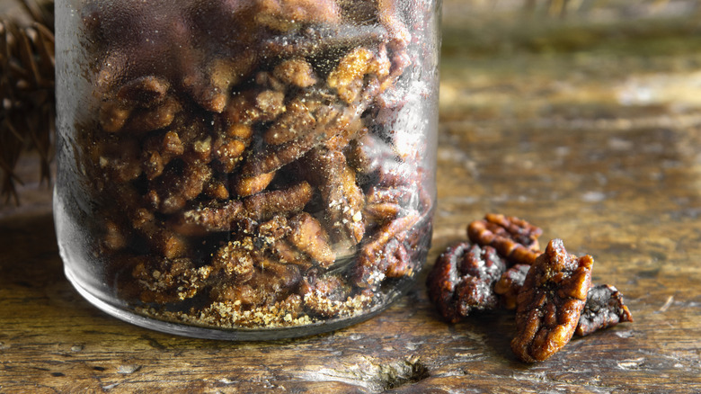 roasted pecans in a glass jar