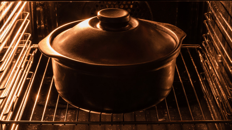 lidded pot inside an oven