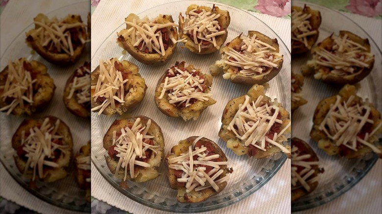 smashed potatoes topped with pizza sauce and cheese