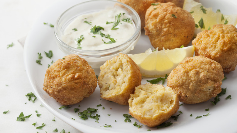 Plate of whole and split hush puppies