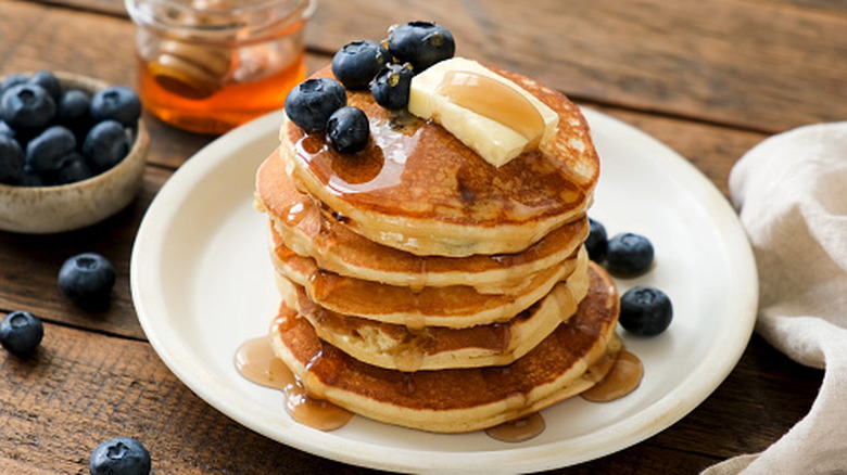 blueberries on pancakes stack