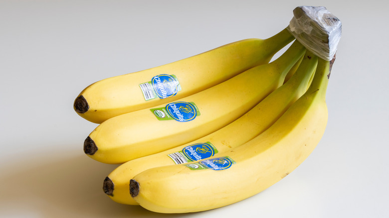 banana bunch with plastic wrap