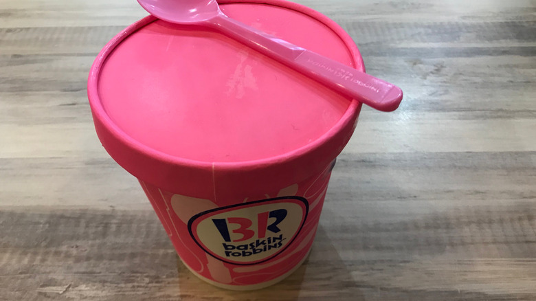 Pint of Baskin-Robbins ice cream topped with spoon