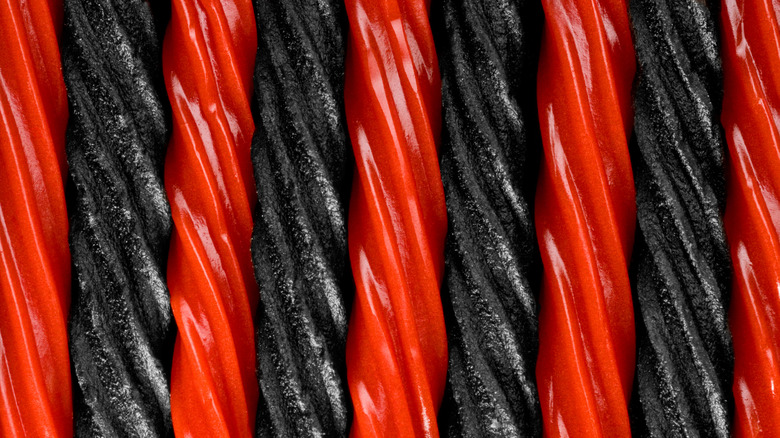 A close up shot of red and black licorice twists