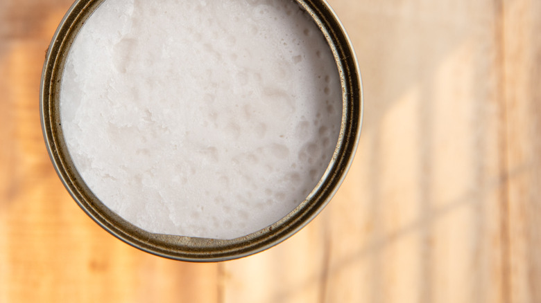 top view of opened can of coconut