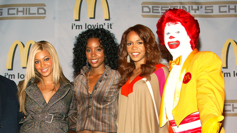 Destiny's Child poses with Ronald McDonald