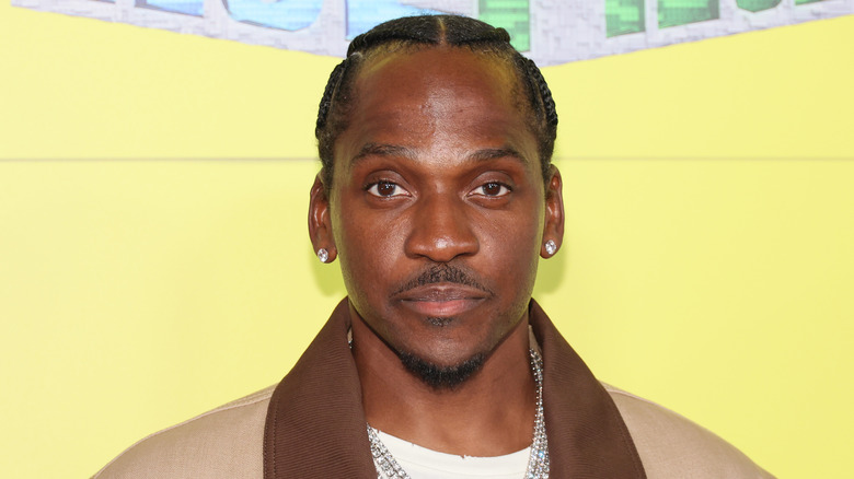 Pusha T looking into camera