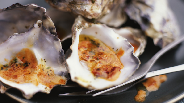 Grilled oysters on plate