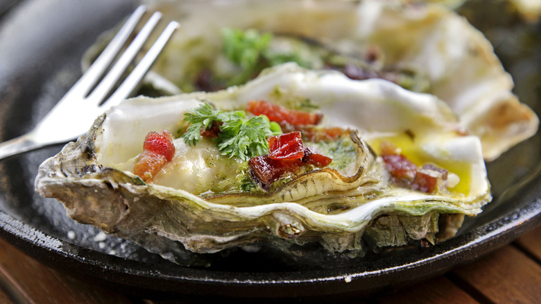 Grilled oysters on a plate