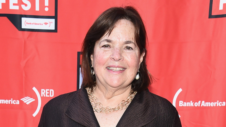 Ina Garten smiling while on the red carpet.