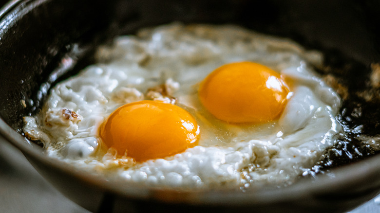 Fried eggs in cast iron skillet