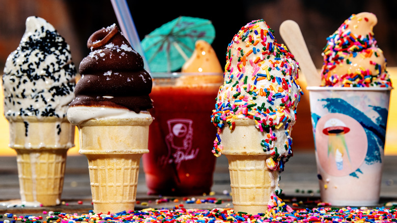 Various cups and cones of soft serve