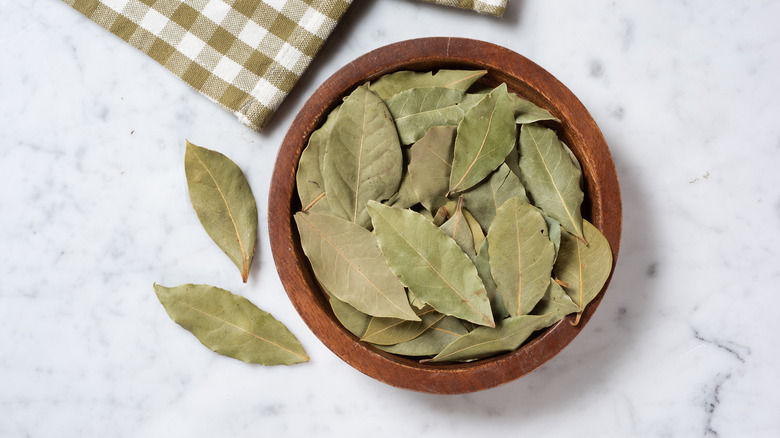 dried bay leaves in bowl