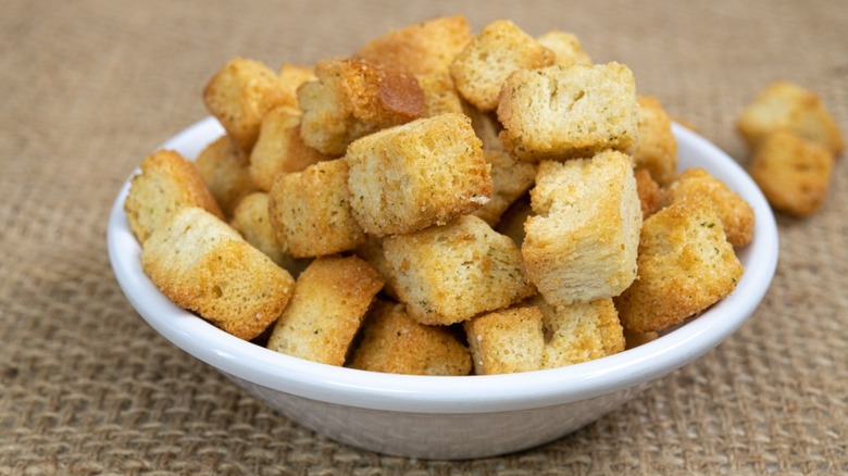 White bowl filled with croutons